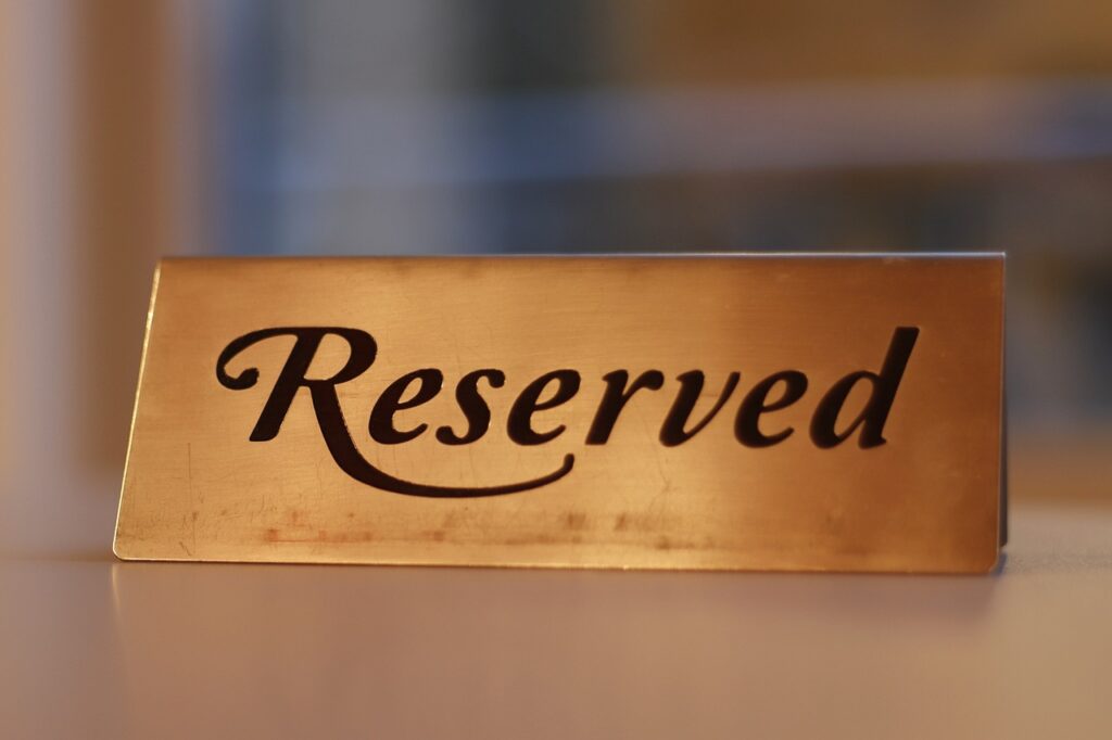 OpenTable reservation interface showing booked tables